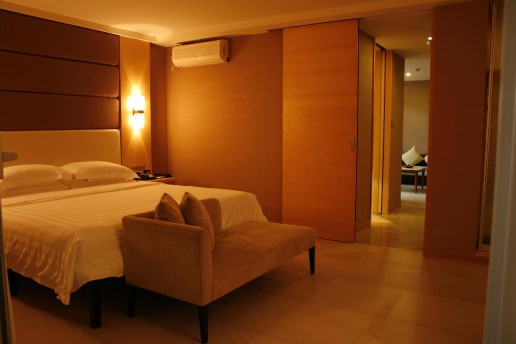 Guesthouse International Hotel Sanya Quarto foto