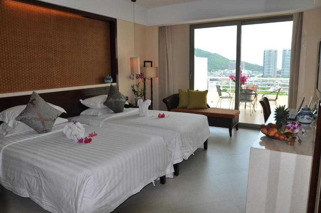 Guesthouse International Hotel Sanya Quarto foto