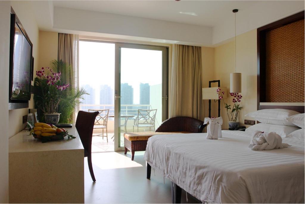 Guesthouse International Hotel Sanya Quarto foto