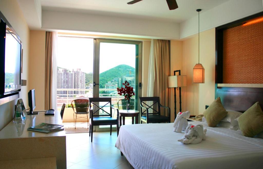Guesthouse International Hotel Sanya Quarto foto