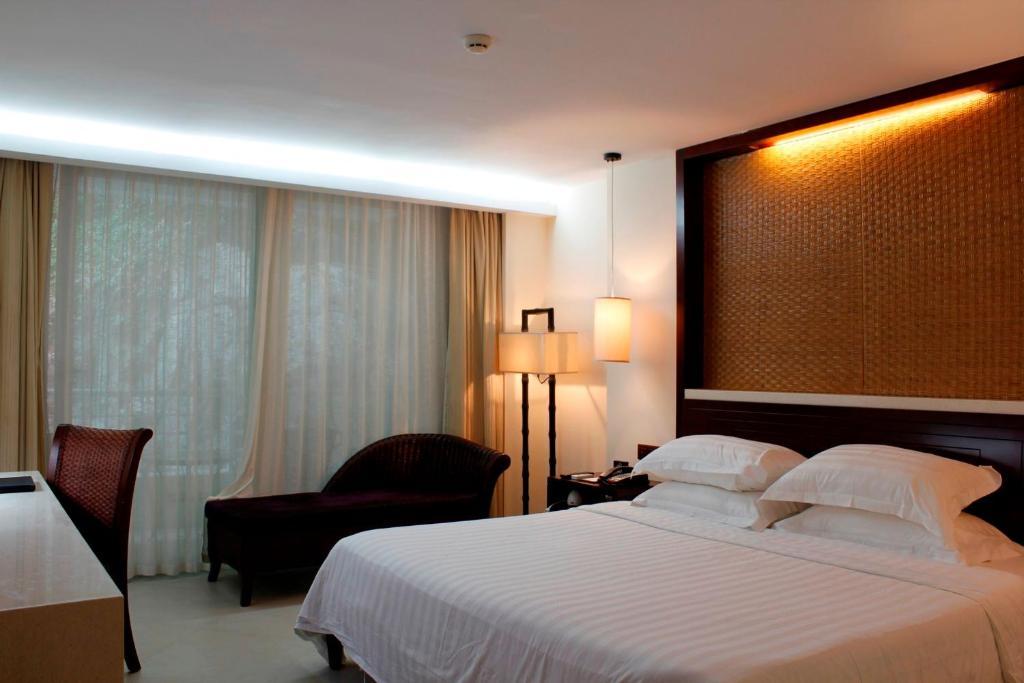 Guesthouse International Hotel Sanya Quarto foto